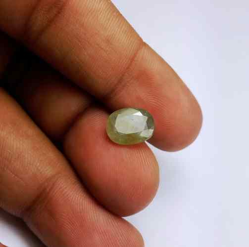 3.85 Carats Ceylon Greenish Yellow Sapphire 10.51 x 8.21 x 4.18 mm