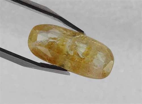 3.93 Carats Orangish Yellow Sapphire 13.93 x 6.14 x 4.82 mm