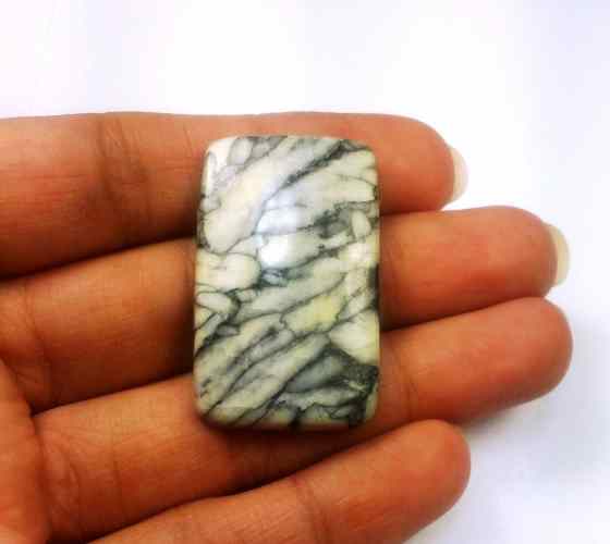 46.67 Carats Pinolith 34.50 X 21.57 X 5.29 mm