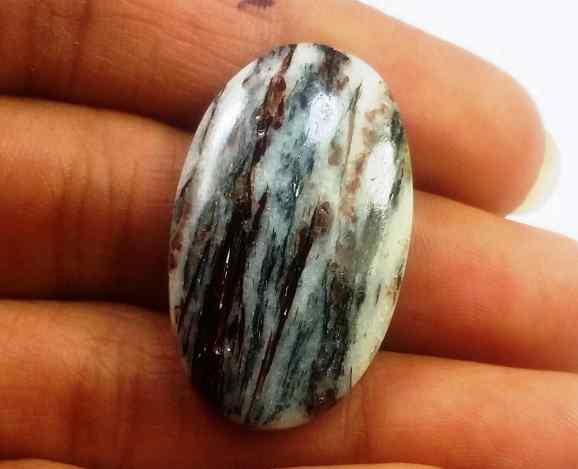 23.82 Carats Astrophyllite 30.42 X 18.24 X 5.01 mm