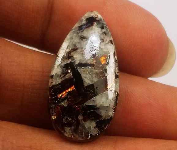 26.18 Carats Astrophyllite 25.71 X 25.57 X 4.58 mm