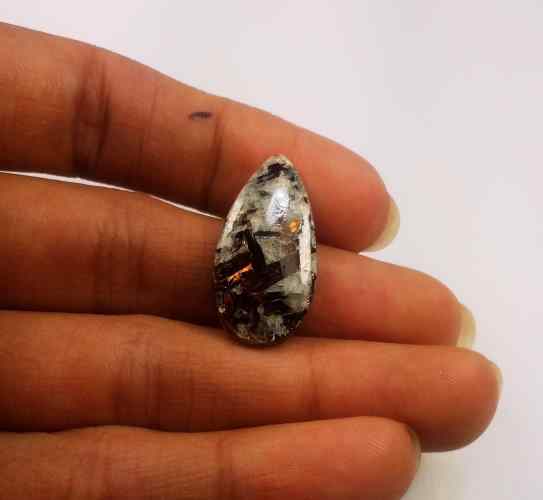 26.18 Carats Astrophyllite 25.71 X 25.57 X 4.58 mm