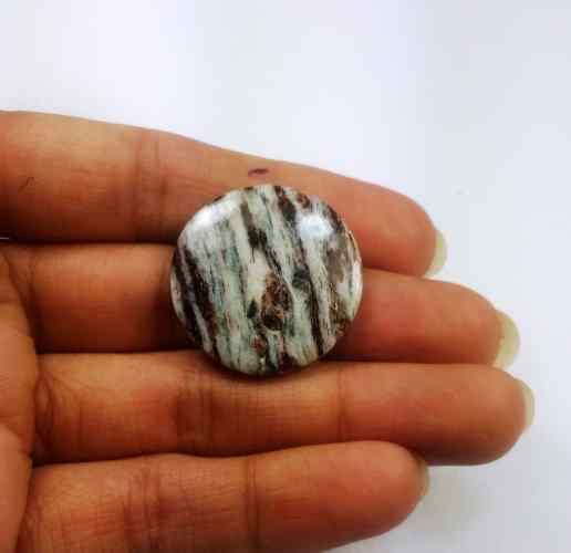 13.27 Carats Astrophyllite 25.76 X 17.85 X 4.33 mm