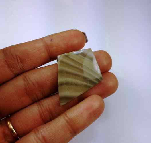 25.96 Carats Striped Flint 33.76 X 26.56 X 4.99 mm