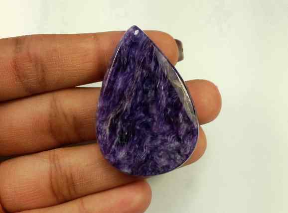 58.00 Carats Purpolite 41.92 X 28.88 X 5.77 mm
