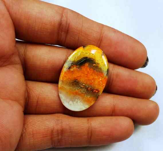 12.68 Carat Yellow-Orange India Bumble Bee 30.95 x 20.77 x 2.51 mm