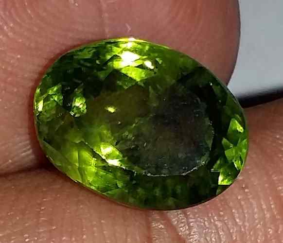 5.7 Carat Green Peridot 11.48x8.53x6.85mm