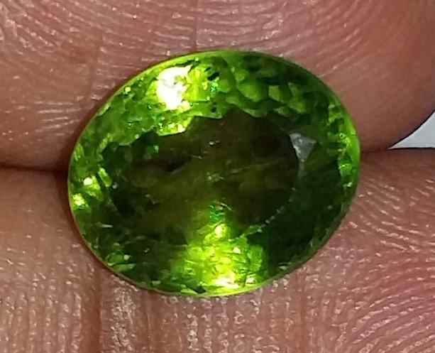 5.65 Carats Green Peridot 11.45x9.15x6.75mm