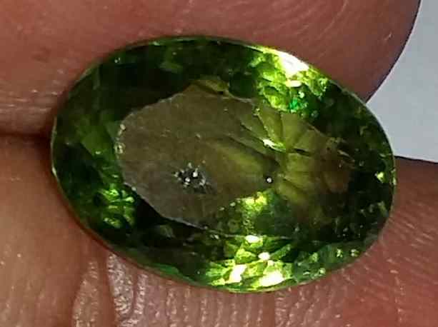 4.91 Carats Green Peridot 12.75x9.25x5.90mm