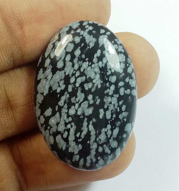 24.72 Carats Snow Obsidian 31.15 x 21.40 x 5.37 mm
