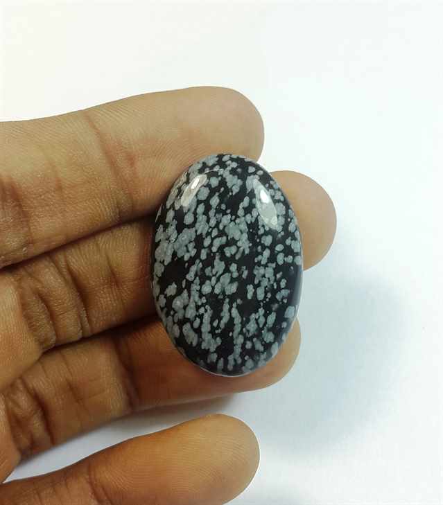 24.72 Carats Snow Obsidian 31.15 x 21.40 x 5.37 mm