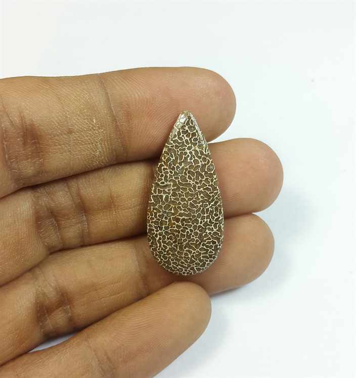 11.78 Carats Dinosour Bone 30.70 x 14.35 x 3.63 mm