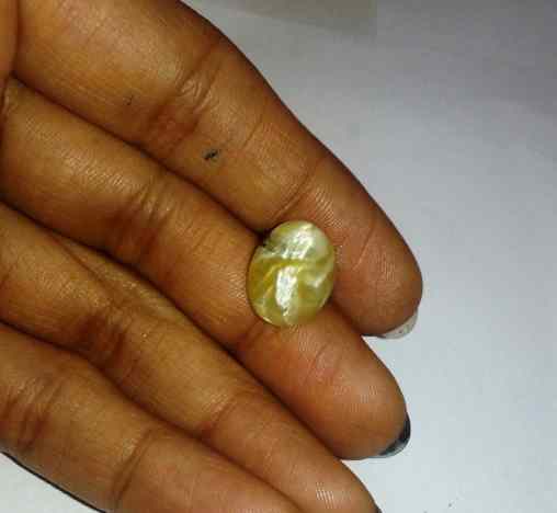 5.09 Carat Yellow Kanak Khet Chrysoberyl Cat's Eye 13.51 x 10.40 x 6.24 mm